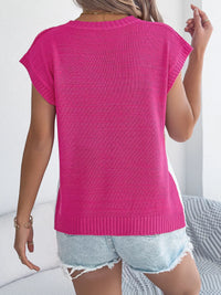 Pink color block cable knit sweater by Trendsi, showcasing a cozy, textured knit pattern with a stylish color block design.