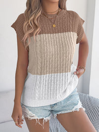 Pink color block cable knit sweater from Trendsi featuring a cozy, chunky knit design and classic crew neckline.