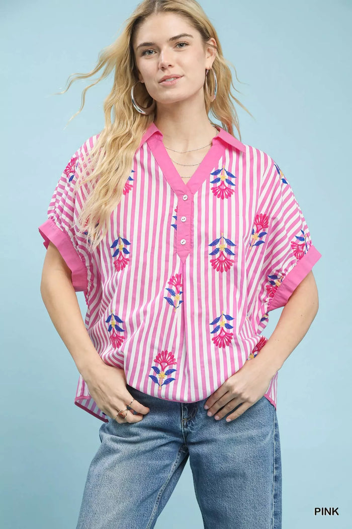 Umgee stripe embroidered boho blouse with button-front closure and relaxed fit, featuring colorful embroidery details.