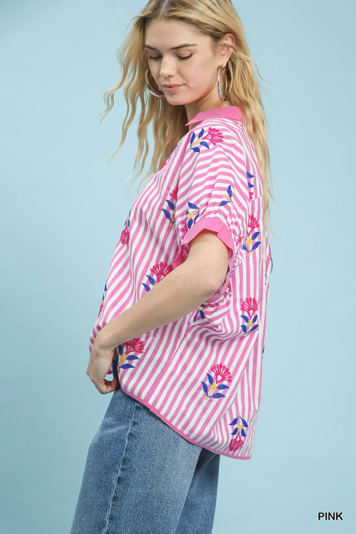 Boho blouse by Umgee featuring vertical stripes, embroidered details, and button-front design, perfect for casual and bohemian styles.