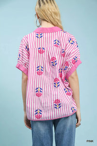 Umgee stripe embroidered boho blouse with button-front and relaxed fit, featuring colorful embroidery and lightweight fabric.