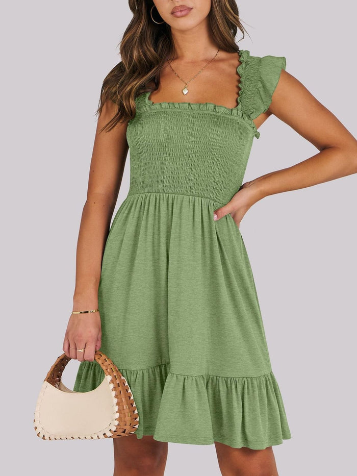 Sage green smocked ruffle hem mini dress by Trendsi, featuring a fitted bodice, ruffled hem, and stylish mini length.