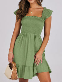 Sage green smocked ruffle hem mini dress by Trendsi, featuring a fitted bodice and playful ruffle details at the hem.