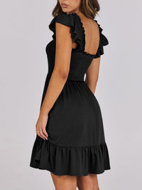 Sage green smocked ruffle hem mini dress by Trendsi, featuring a fitted bodice, ruffled hem, and adjustable straps.
