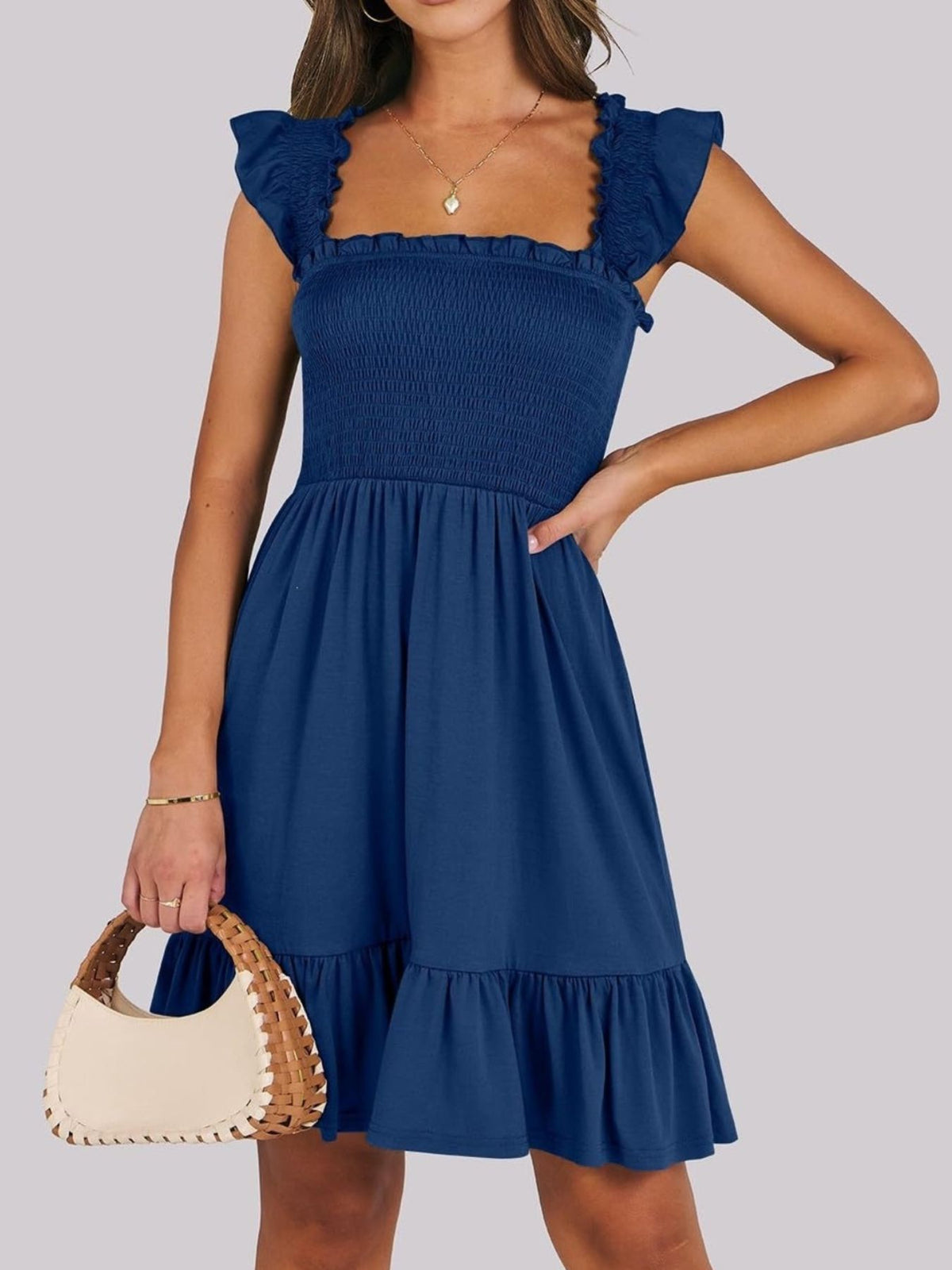 Sage green smocked ruffle hem mini dress by Trendsi featuring a fitted bodice and playful ruffle details.