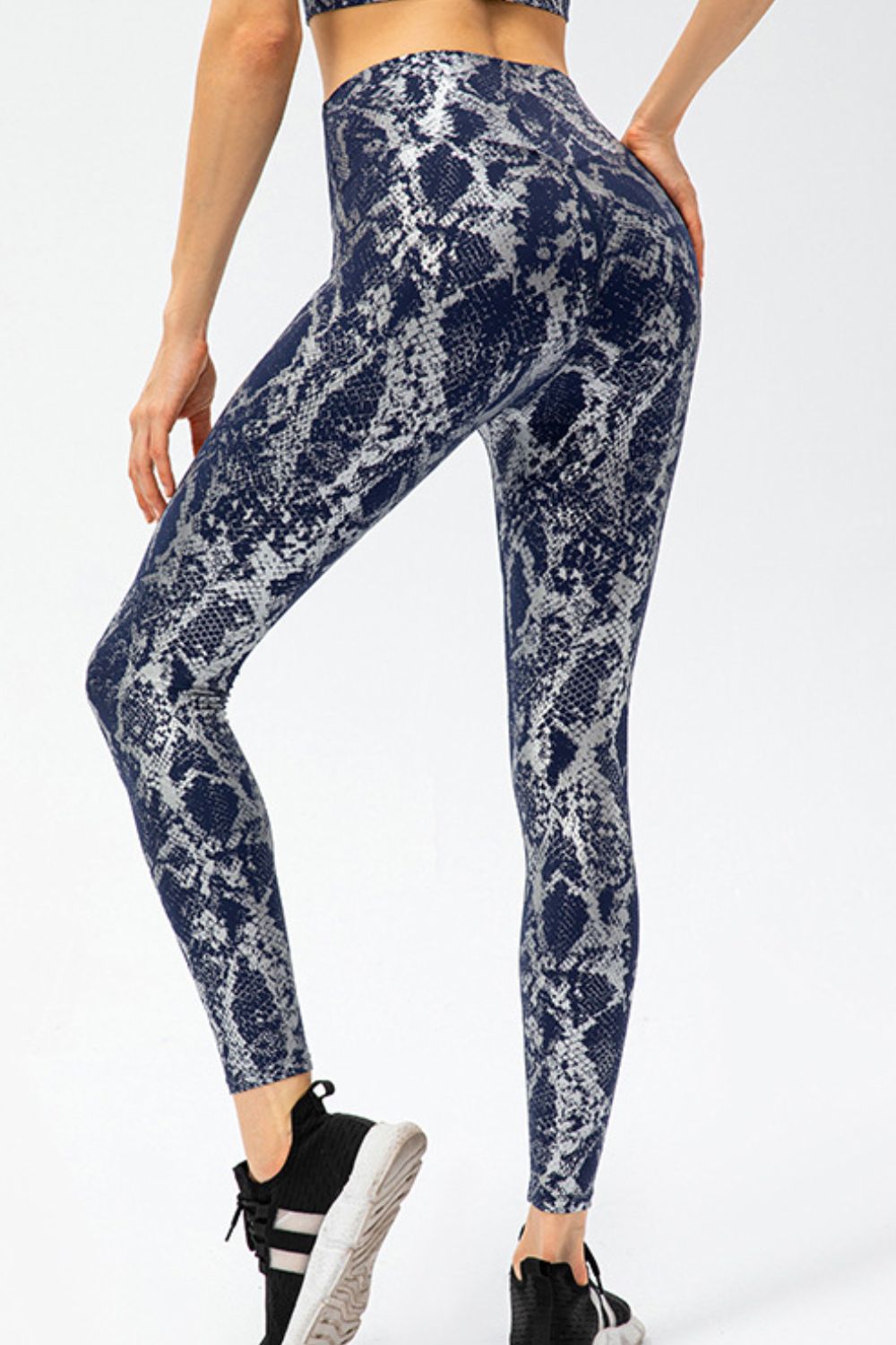 Animal print slim fit long sports pants with wide waistband, designed for active wear by Trendsi.