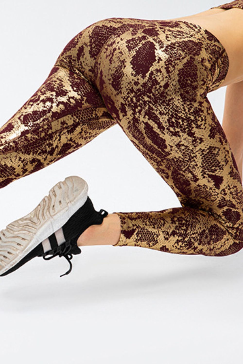 Animal print slim fit sports pants with wide waistband, designed for active wear, by Trendsi.