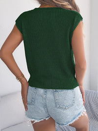 White cable knit cap sleeve sweater by Trendsi, featuring a cozy, textured knit design and a stylish cap sleeve fit.