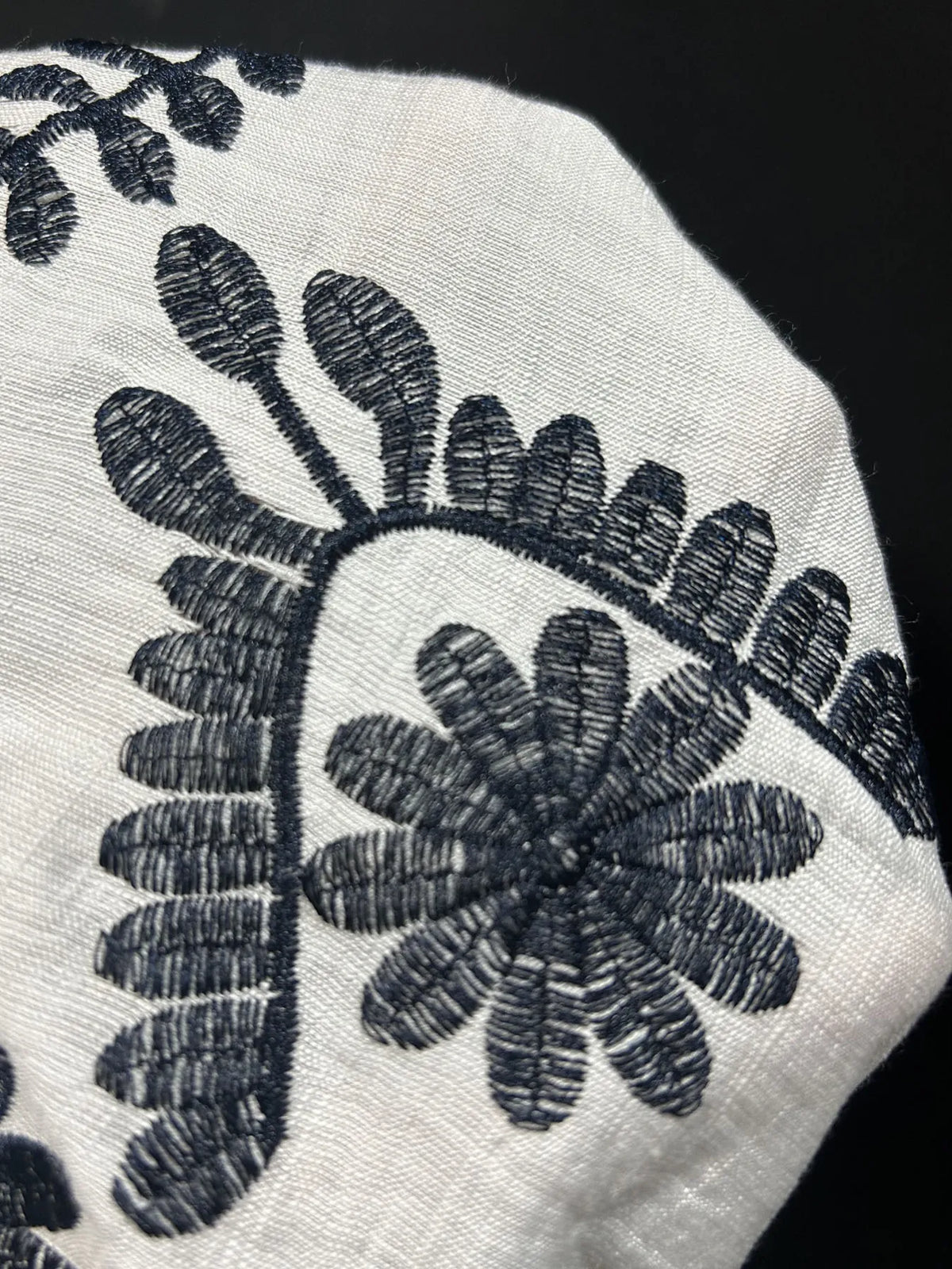 Embroidered long sleeve blouse by Trendsi featuring intricate floral embroidery and lightweight fabric for a stylish look.