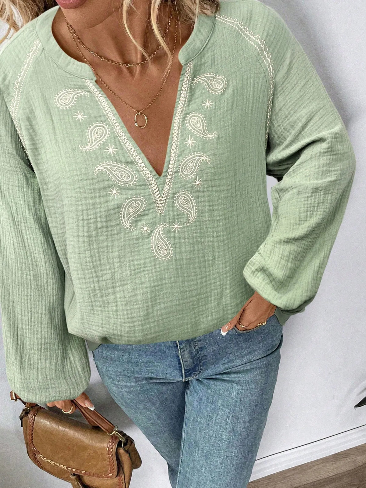 Paisley pattern notched long sleeve blouse from Trendsi, featuring a stylish design with a collar and button-down front.