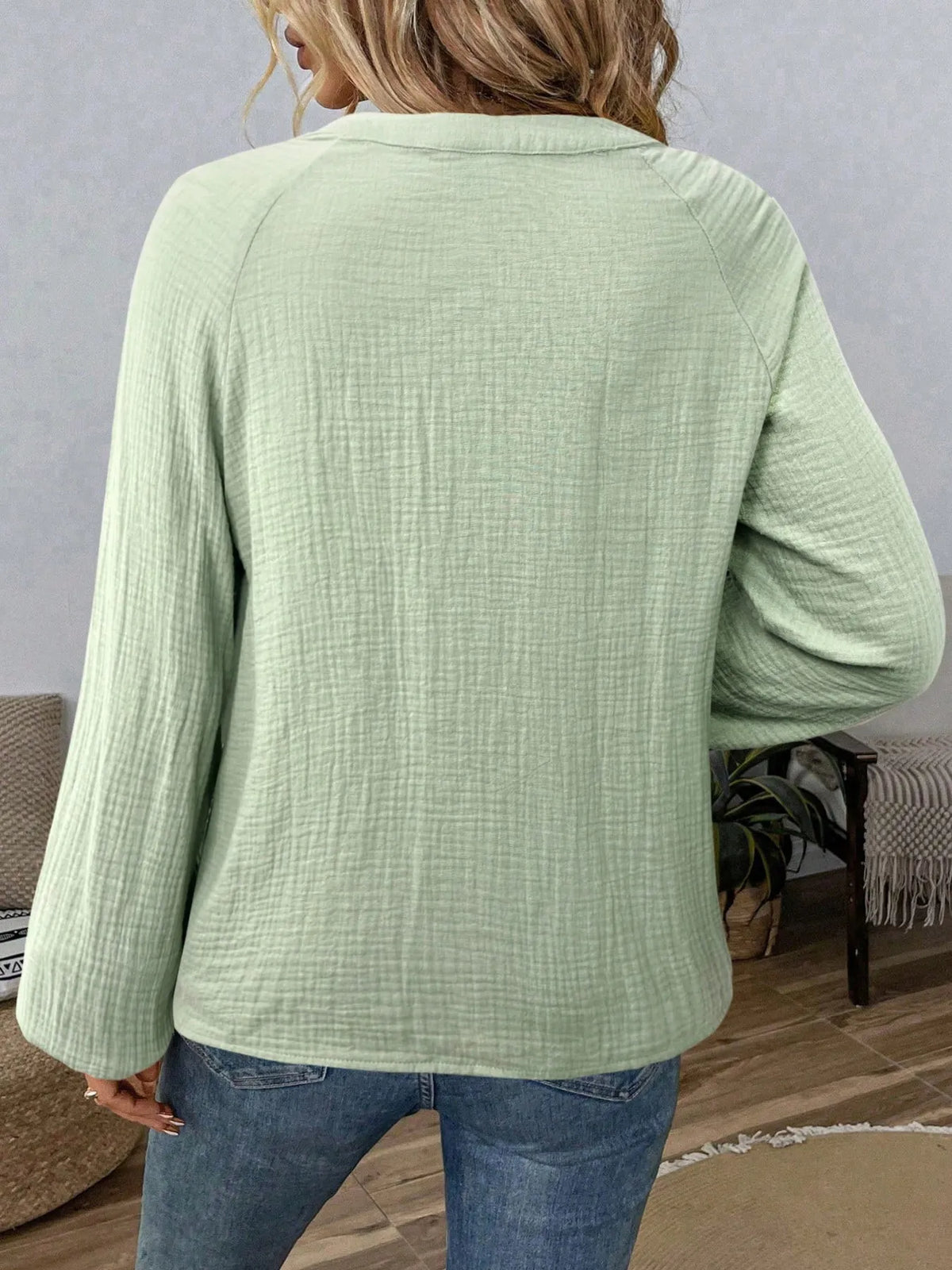 Paisley pattern notched long sleeve blouse by Trendsi, featuring a stylish design with a classic collar and button front.