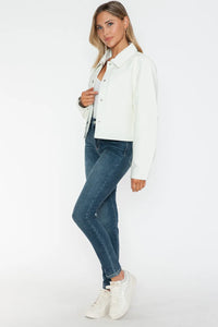 White Snobbish Snap Down Long Sleeve PU Leather Jacket by Trendsi, featuring a sleek design and snap button details.