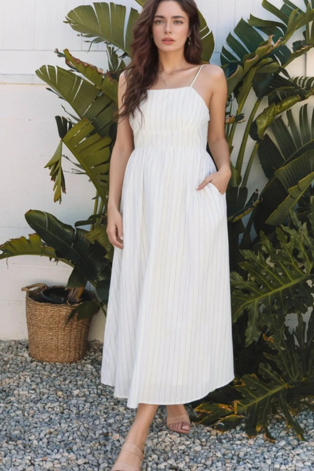 White stripe square neck cami dress with pockets by Trendsi, lightweight fabric, sleeveless design, and relaxed fit.