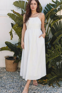 White stripe square neck cami dress with pockets by Trendsi, lightweight fabric, sleeveless design, and relaxed fit.