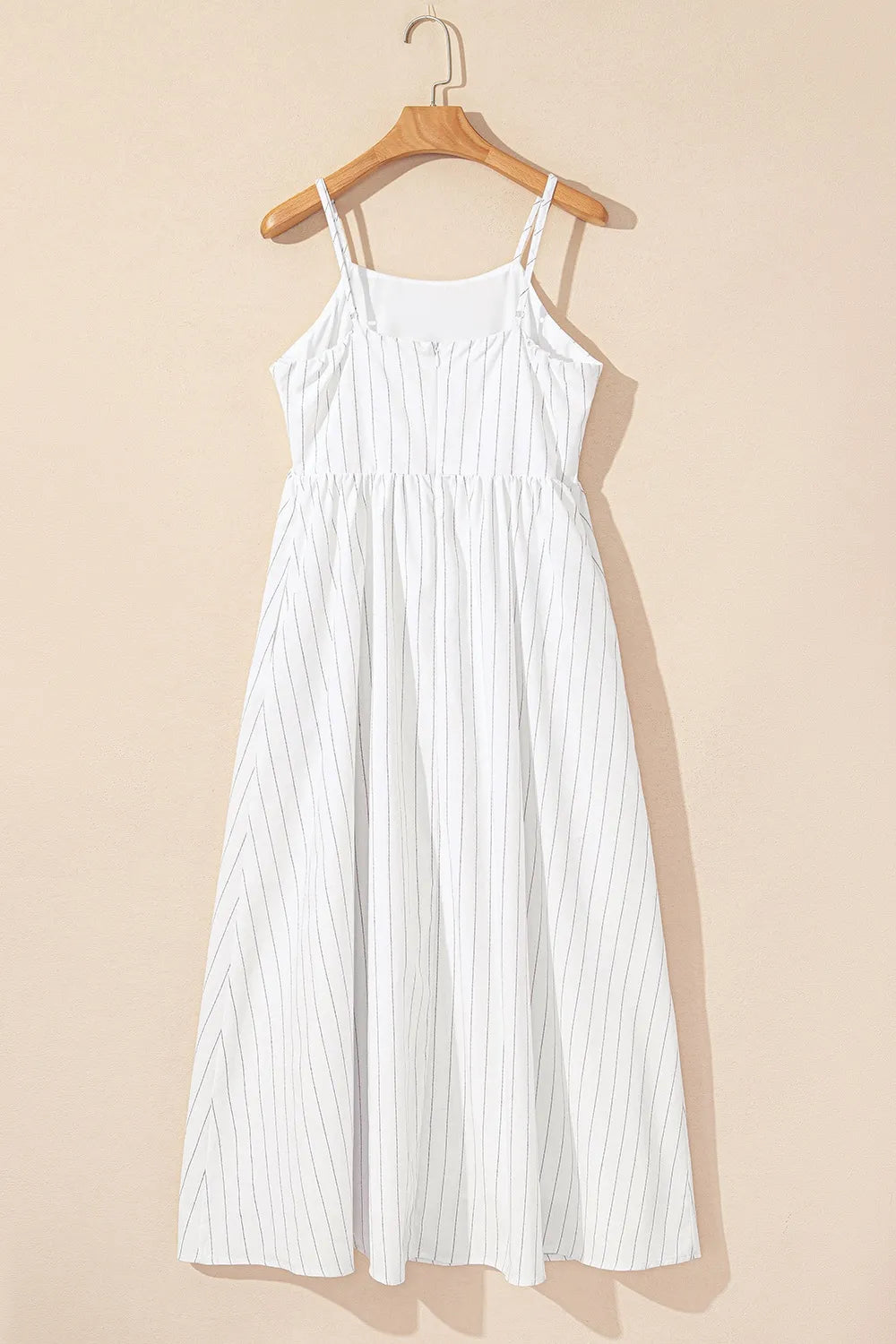White stripe square neck cami dress by Trendsi featuring a fitted bodice, side pockets, and a stylish sleeveless design.