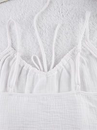 Relaxed fit cami and shorts set with tie front detail, casual trendy loungewear by Trendsi, shown in a stylish, comfortable fabric.