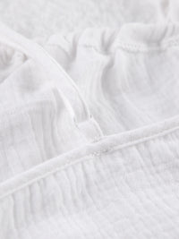 Relaxed fit cami and shorts set with tie front detail, casual summer outfit by Trendsi, shown in soft fabric with comfortable fit.