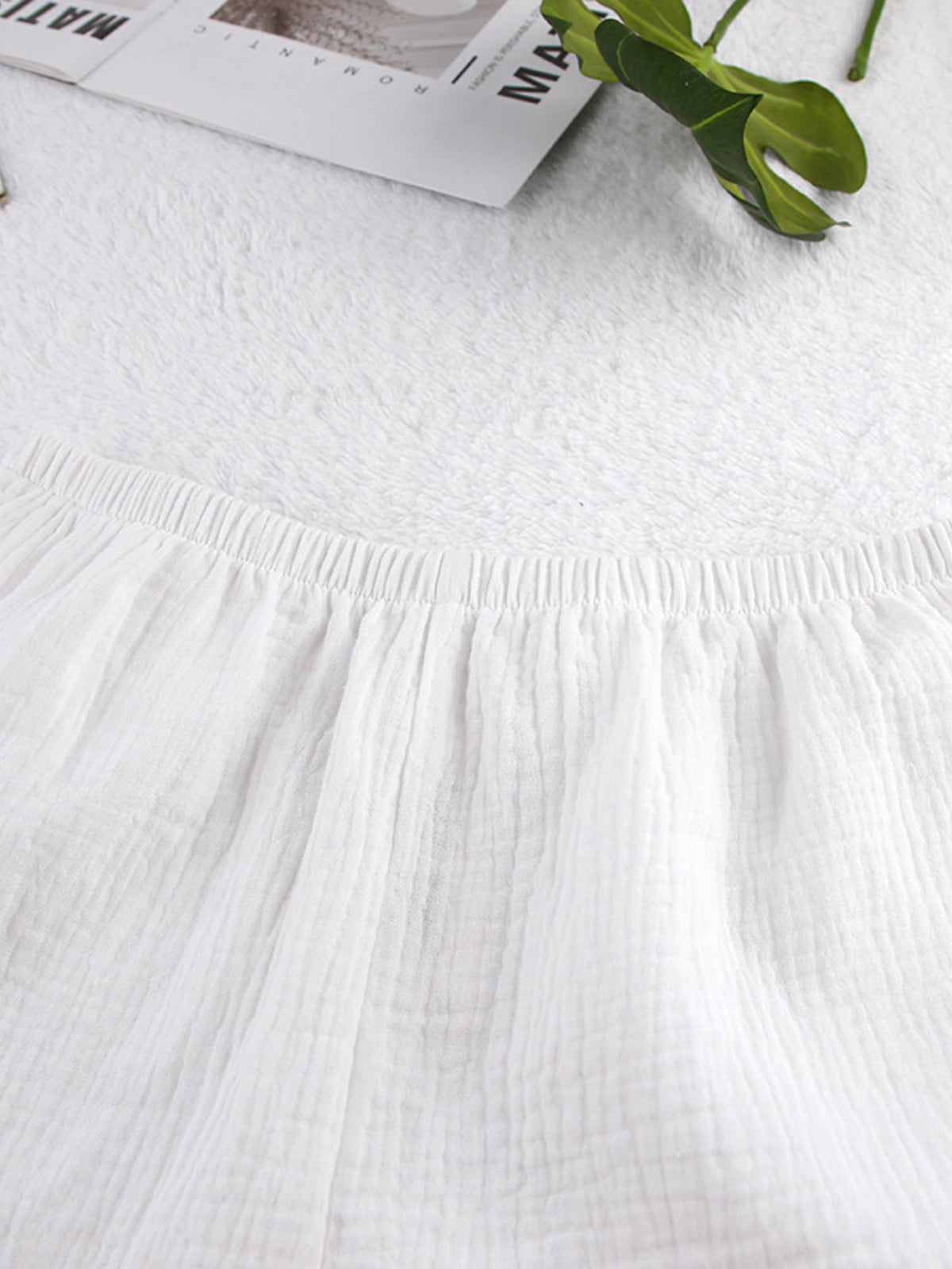 Relaxed fit cami and shorts set with tie front detail, trendy and comfortable, styled for casual wear, by Trendsi.