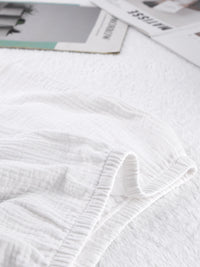 Tie front relaxed fit cami and shorts set by Trendsi, featuring a lightweight fabric and casual summer style.
