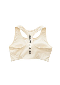 Vardagen "Do The Work" sports bra in black, shown laid flat with supportive design and breathable fabric for activewear.