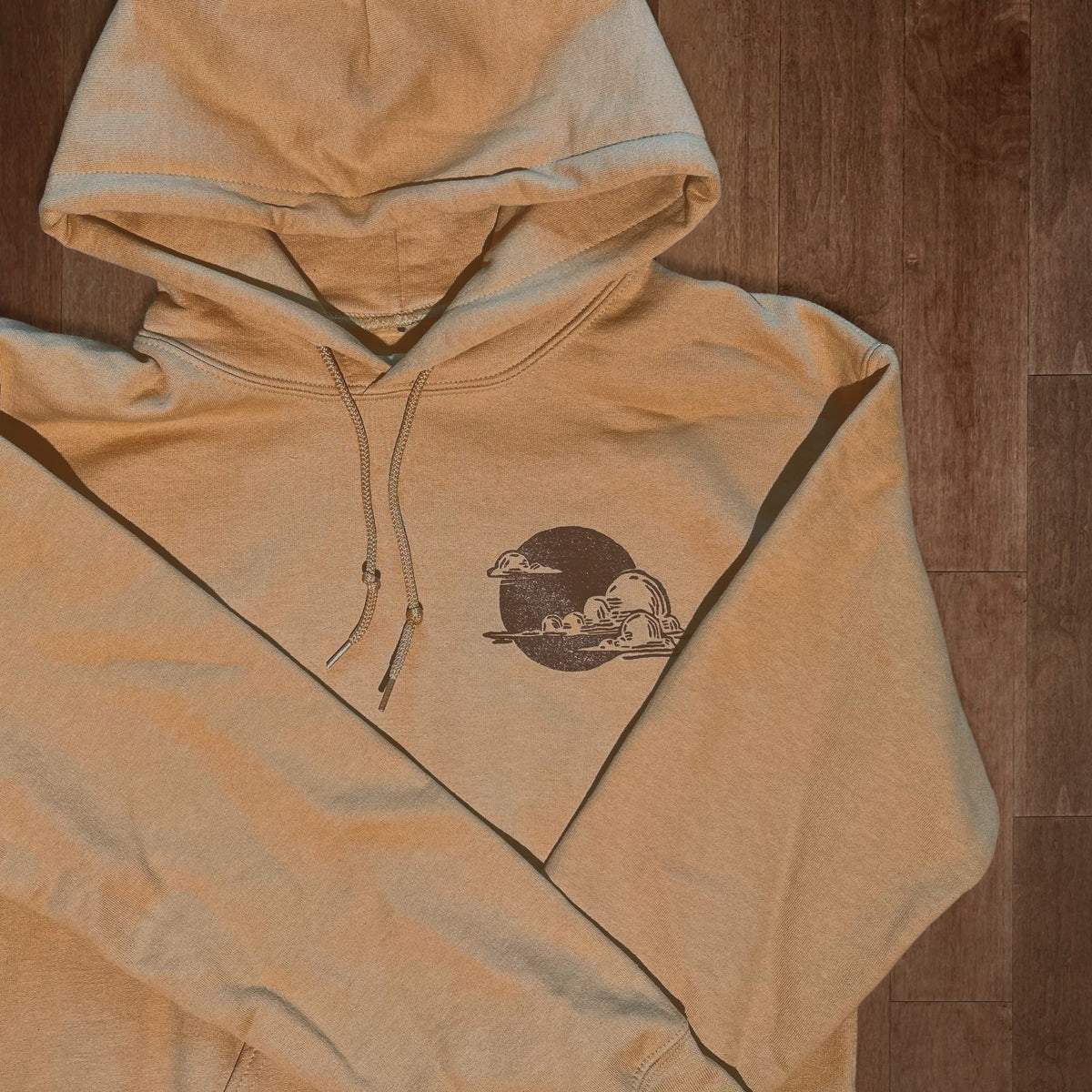 VesperTwine Thundercloud Hoodie in gold, featuring a comfortable fit and storm cloud graphic design on soft fabric.