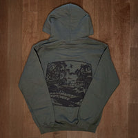 Olive green VesperTwine Home to the Unknown hoodie with front pocket and drawstring hood, casual and comfortable for everyday wear.
