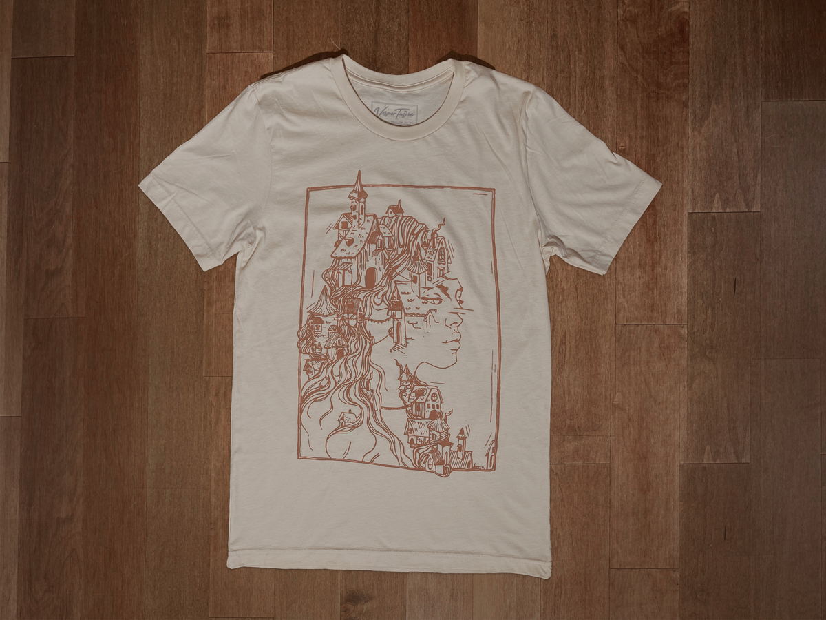 VesperTwine Gaia T-Shirt in chestnut color, casual shirt made from soft fabric, shown on a model.