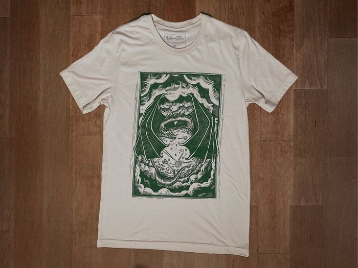 VesperTwine Dragon's Moon T-Shirt showing a mystical dragon and moon design on a moss green shirt, XS size, casual style.