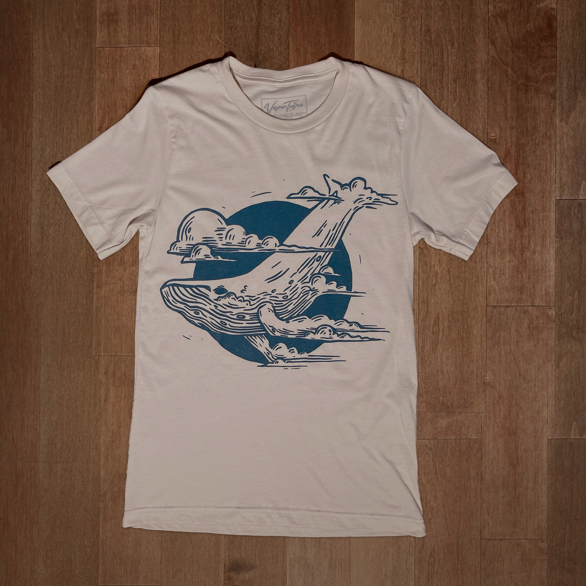 VesperTwine Thundercloud T-Shirt featuring a stormy cloud graphic on a casual shirt, displayed on a plain background.