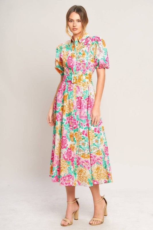 Voglio.us floral print midi dress featuring a flowing fabric and vibrant floral pattern, perfect for casual or semi-formal wear.