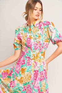 Floral print midi dress from voglio.us featuring a flowy fabric, fitted waist, and vibrant garden-inspired pattern.