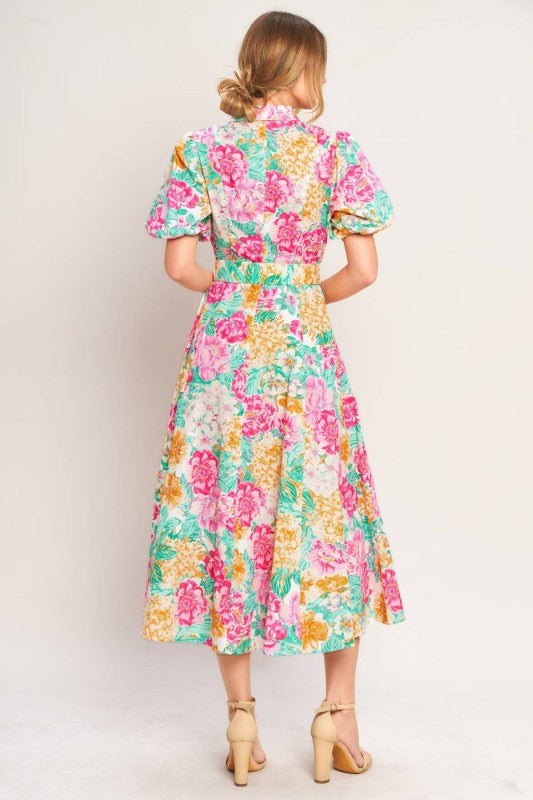 Floral print midi dress by voglio.us featuring a flowy design with vibrant flower patterns on lightweight fabric.