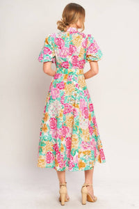 Floral print midi dress by voglio.us featuring a flowy design with vibrant flower patterns on lightweight fabric.