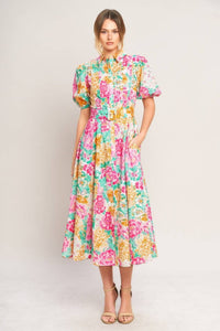 Floral print midi dress by voglio.us featuring a fitted bodice and flowing skirt, perfect for spring and summer occasions.