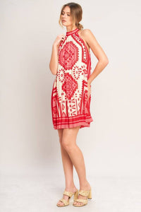 Printed voglio.us halter mini dress showing vibrant floral pattern and halter neckline on lightweight fabric.