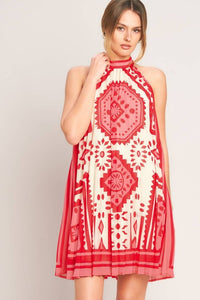 Printed voglio.us halter mini dress featuring bold floral patterns and a fitted silhouette, perfect for summer or casual outings.
