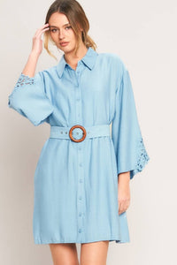 Soft blue belted shirt dress by voglio.us, featuring a collared neckline, long sleeves, and a waist belt for a casual chic look.