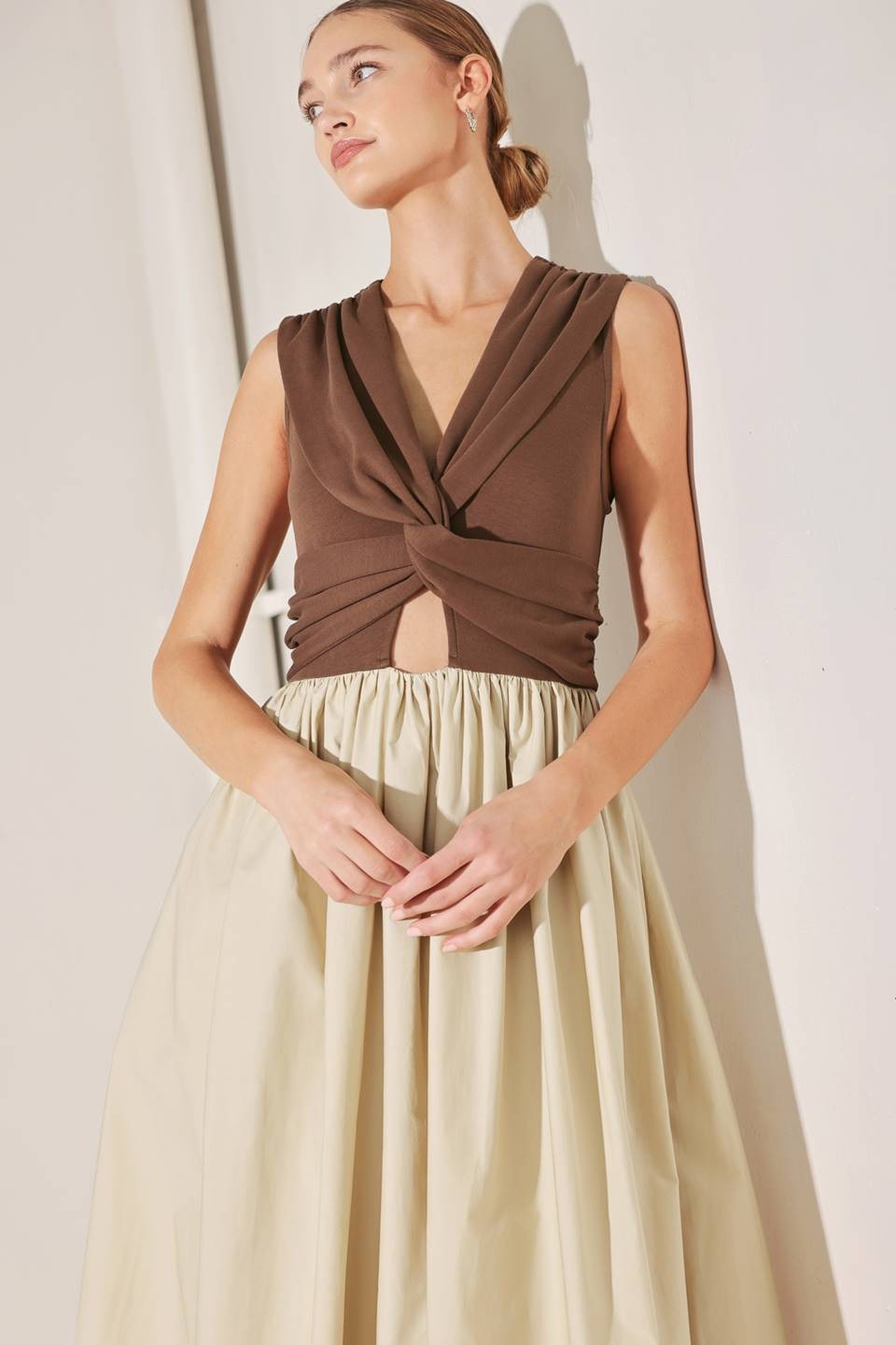 Two-tone twist front midi dress from voglio.us, featuring a stylish design with a fitted waist and flowing skirt.