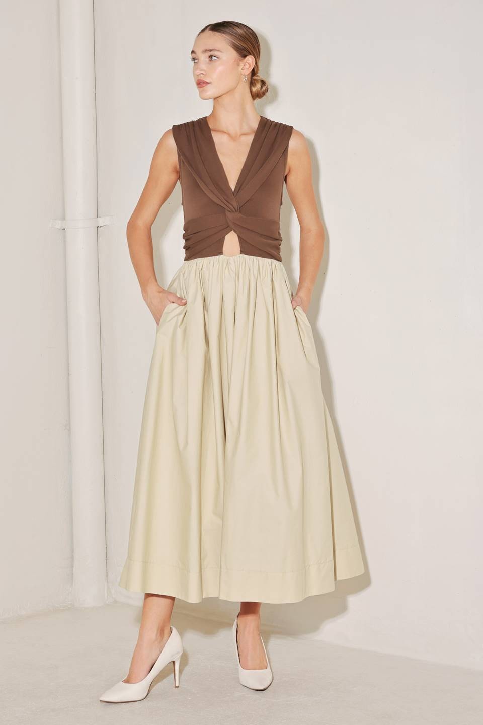 Two-tone twist front midi dress by voglio.us featuring a stylish design and fitted silhouette on a white background.