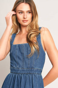 Washed denim midi dress by voglio.us featuring a casual fit, sleeveless design, and classic denim wash.