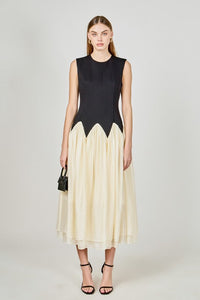 Voglio.us contrast color midi dress featuring a stylish design, sleeveless cut, and vibrant color blocking for a modern look.