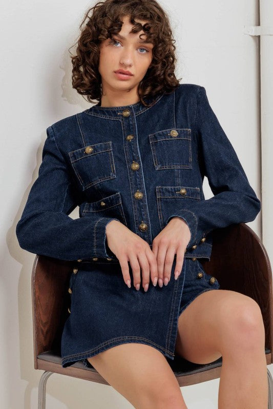 Voglio.us denim utility jacket with gold buttons, featuring a casual fit and multiple pockets, stylishly displayed on a hanger.