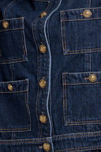 Denim utility jacket with gold buttons, stylish and durable, featuring multiple pockets and a classic fit from voglio.us.