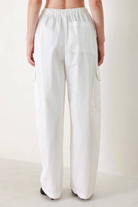 Cotton balloon cargo pants by voglio.us featuring a relaxed fit, multiple pockets, and a casual style in soft cotton fabric.