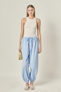 Lightweight Balloon Fit Pants from voglio.us, showing relaxed fit and soft fabric, styled casually on a model.