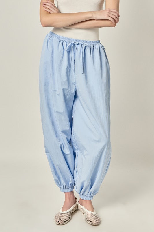 Lightweight Balloon Fit Pants by voglio.us, showing relaxed fit with soft fabric and tapered legs, perfect for casual wear.