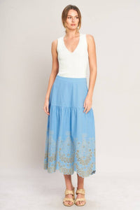 Blue eyelet midi skirt by voglio.us featuring a flowing design with eyelet detailing and a stylish midi length.