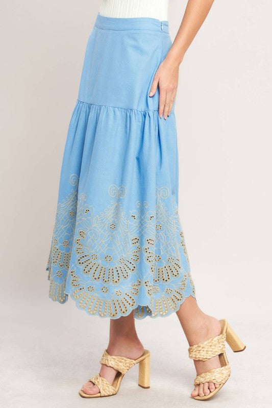 Blue eyelet midi skirt by voglio.us featuring a stylish, lightweight design with eyelet detailing and a flowy silhouette.