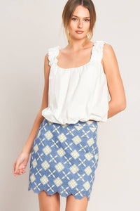 Blue woven lace mini skirt from voglio.us featuring intricate lace details and a fitted waistband.