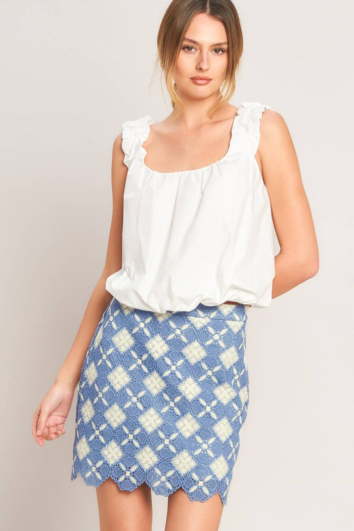 Blue woven lace mini skirt from voglio.us featuring intricate lace details and a fitted waistband.